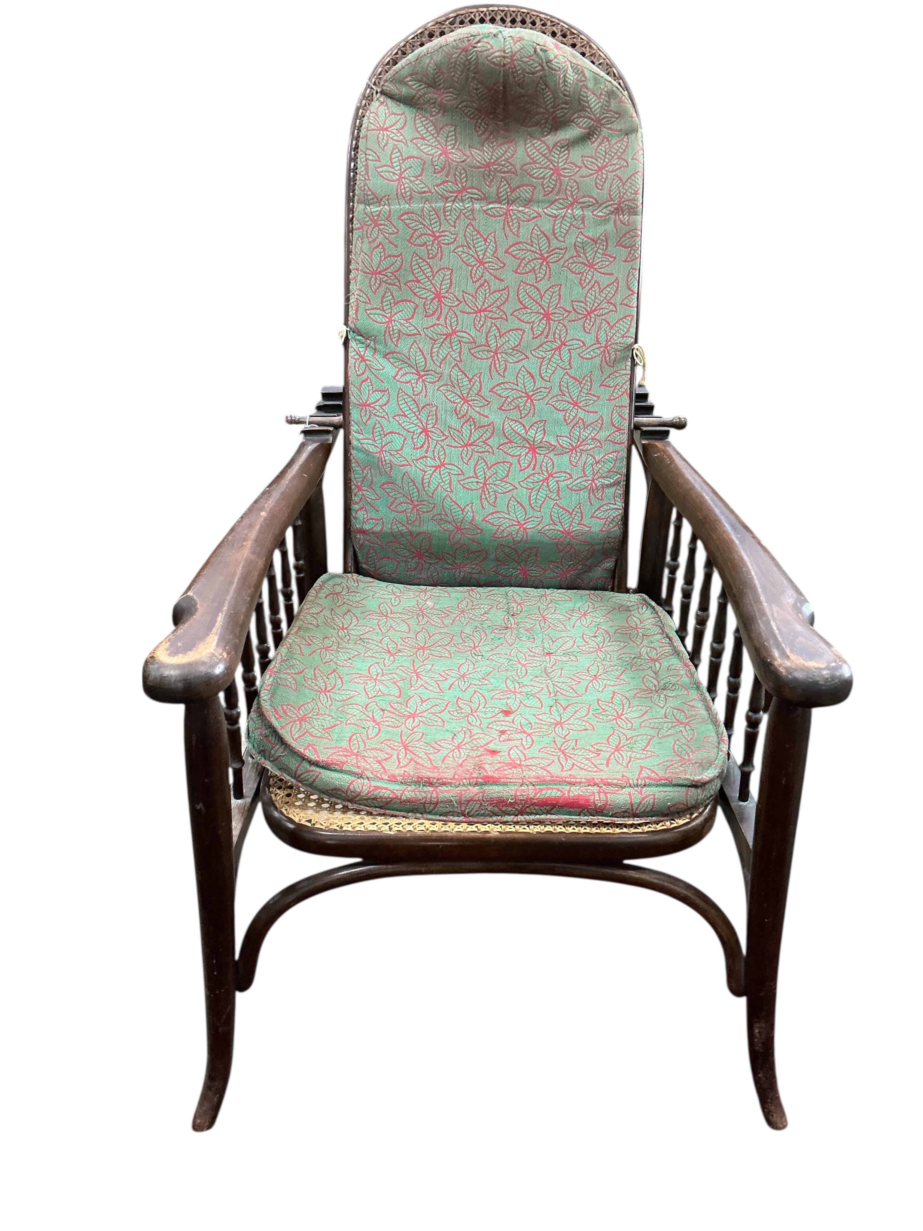 An early 20th century Fischel caned bentwood reclining armchair, width 64cm, depth 86cm, height 107cm